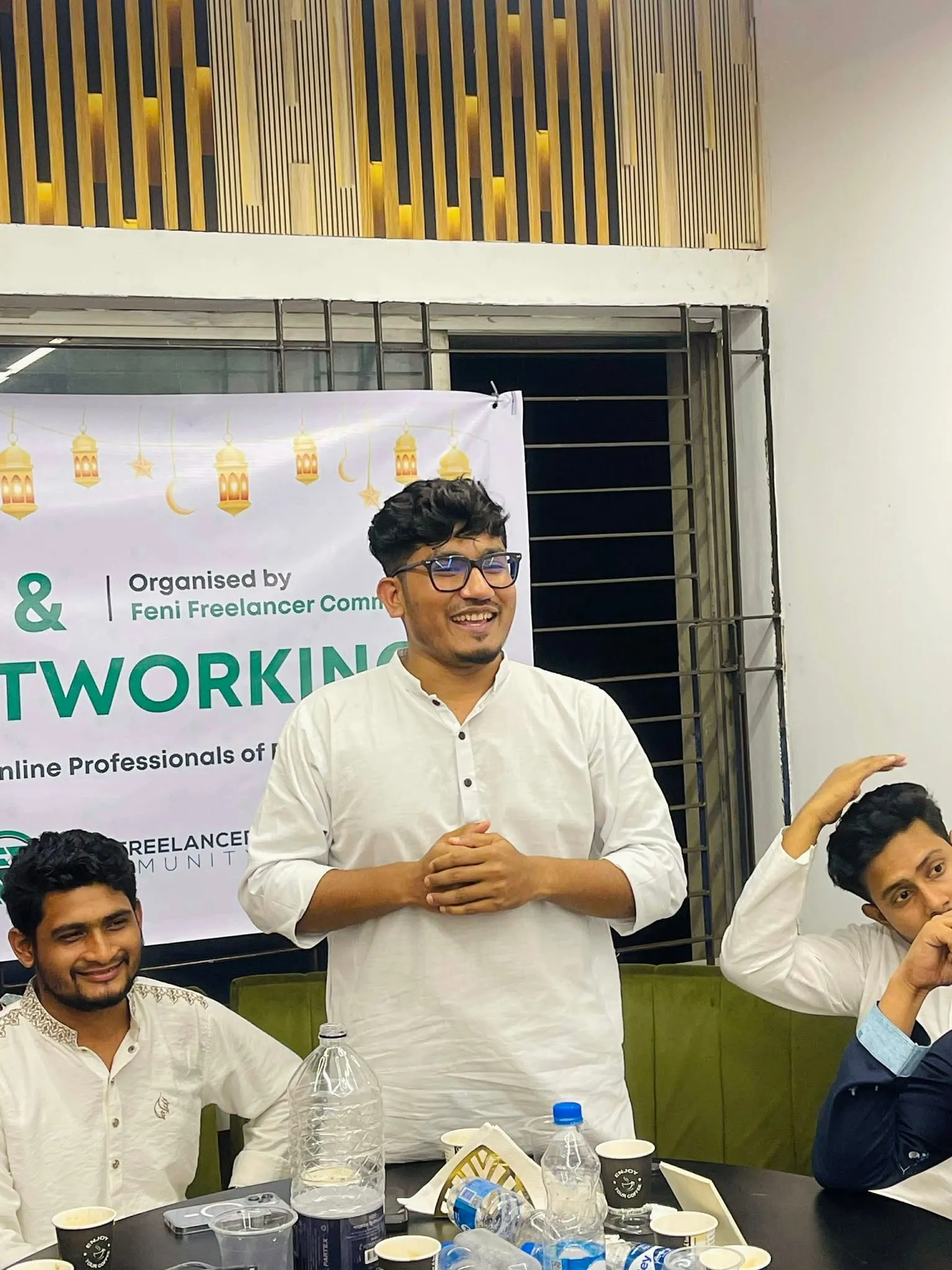 Shakawat Hridoy speaking to a room at a Feni Freelancer Community networking event