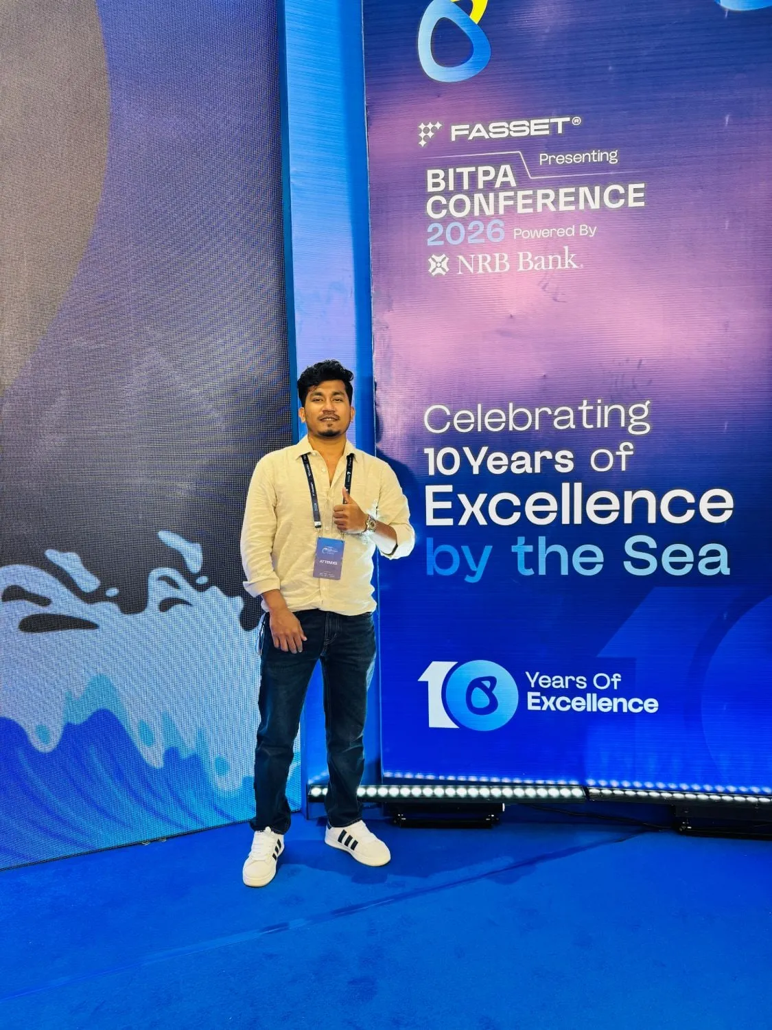 Shakawat Hridoy beside the BITPA Conference 2026 banner that reads Celebrating 10 Years of Excellence by the Sea