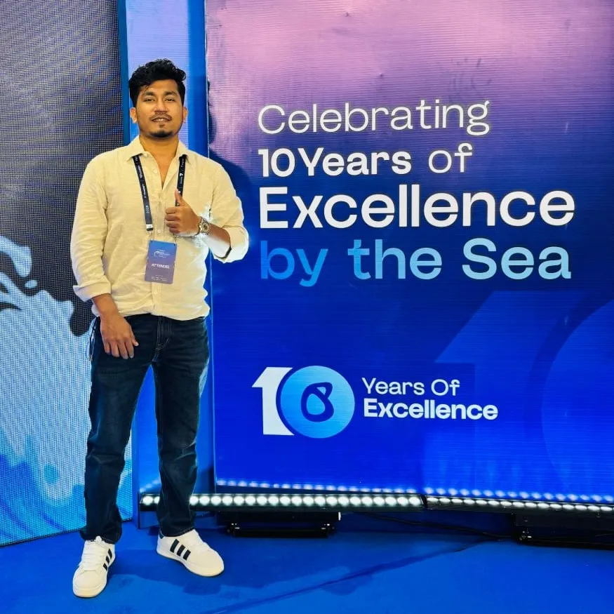 Shakawat Hridoy standing beside the BITPA Conference 2026 stage banner, which reads "Celebrating 10 Years of Excellence by the Sea"
